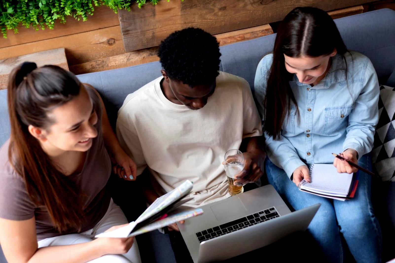 Professional learning environment with financial analysis materials and laptop